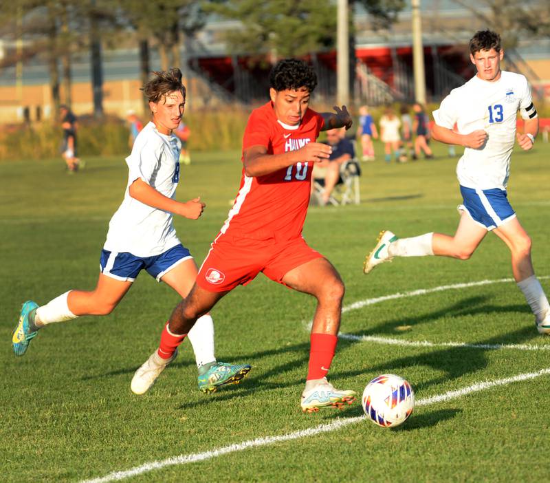 Oregon's Steven Guardado (10) charges onto the ball against Hinckley-Big Rock during Thursday, Sept. 19, 2024 action at Oregon Park West.
