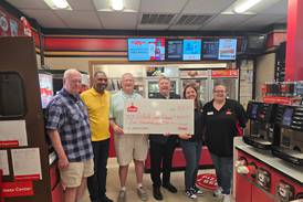 Cortland Casey’s donates lottery reward money to local charities