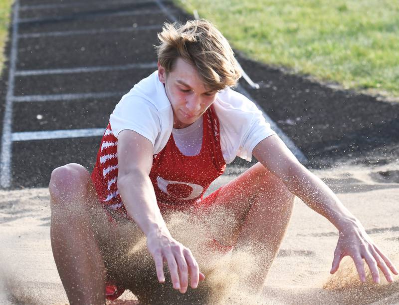 Oregon's Brian Wallace lands in the sand as he competes in the triple  jump at the Big Northern Conference Meet at Stillman Valley on Thursday, May 14, 2026.