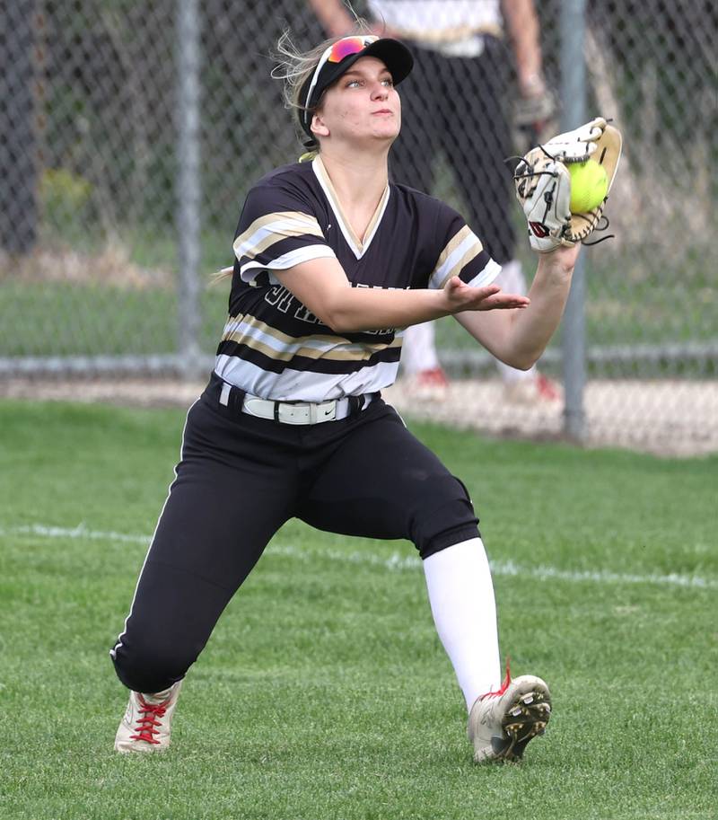 Sycamore's Annabella Johnson tries to make a running catch during their game against Ottawa Thursday, May 2, 2024, at Sycamore High School.
