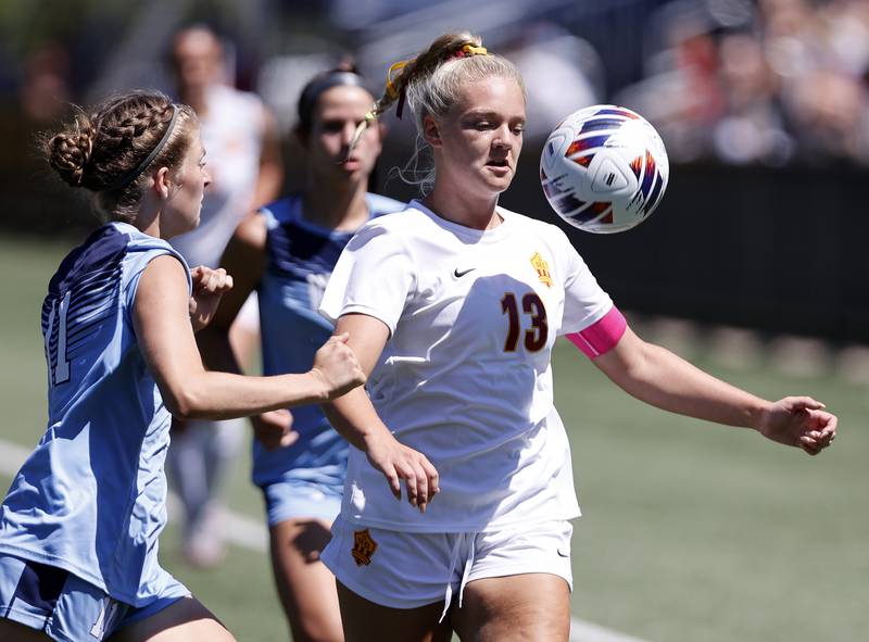 Richmond-Burton's Jordan Otto (13) tracks down the ball during the Class 1A Dominican super-sectional between Willows Academy and Richmond-Burton HS in River Forest on Saturday, May 25, 2024.