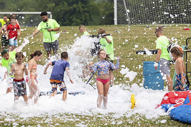 Dixon Park District SPARK campers were treated Thursday, June 15, 2023 to a foam machine on the grounds of The Facility as part of the day camp.