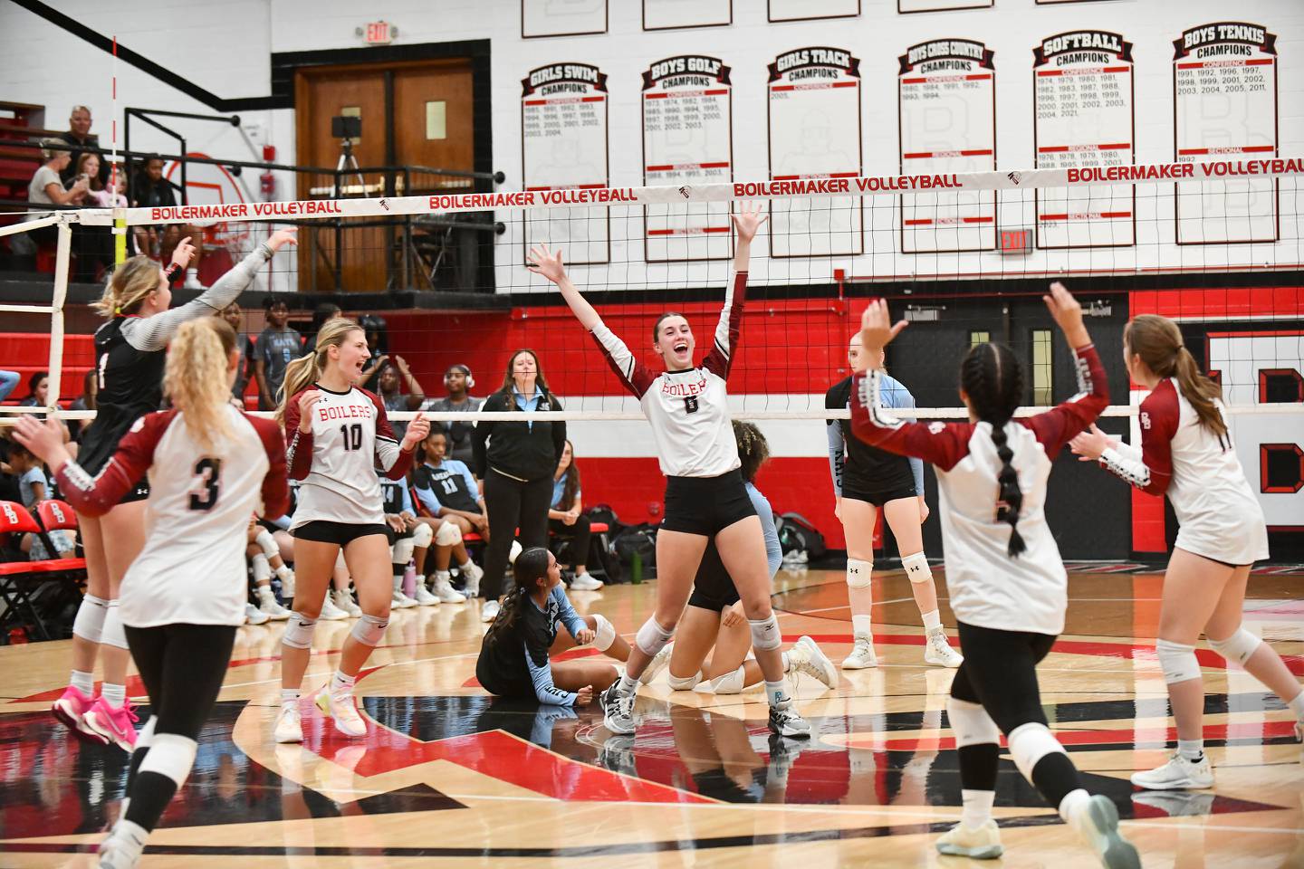 Bradley-Bourbonnais' Emilee Fitzgerald (8) celebrates scoring a point near the end of the second set during the Boilermakers' victory in two sets, 25-12, 25-11, over Kankakee in the All-City matchup on Sept. 10, 2024.