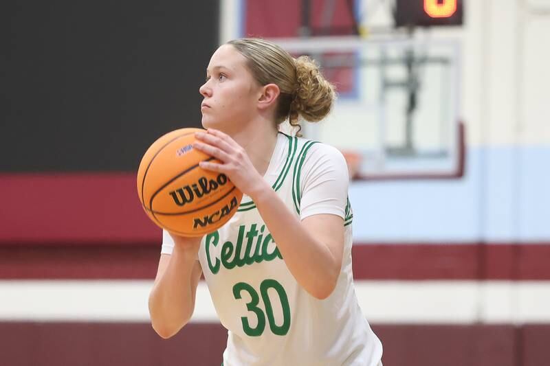 Providence’s Kennady Kotowski lines up the 3-point shot against Washington in the Class 3A Kankakee Super-Sectional game on Monday, March 3, 2026 in Kankakee.