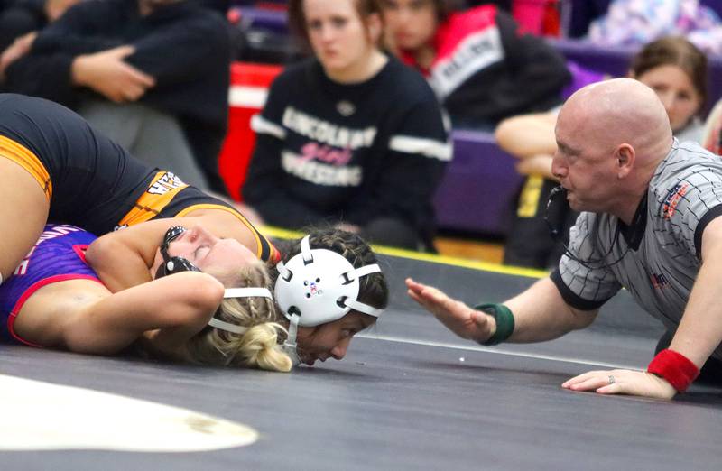 McHenry’s Alexa Colin-Garcia pins Belvidere North’s Lilian Davis at 110 pounds in Whip-Pur Women’s Classic varsity girls wrestling on Saturday, Dec. 20, 2025, at Hampshire High School in Hampshire.