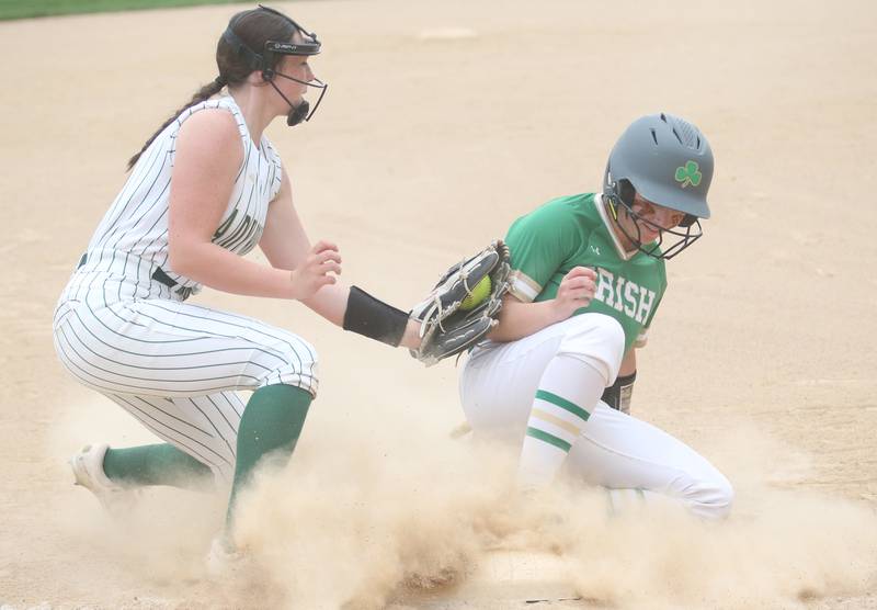 Seneca's Alyssa Zellers steals third base as St. Bede's Morgan Mercer applies a late tag on Monday, May 12, 2025 at St. Bede Academy.