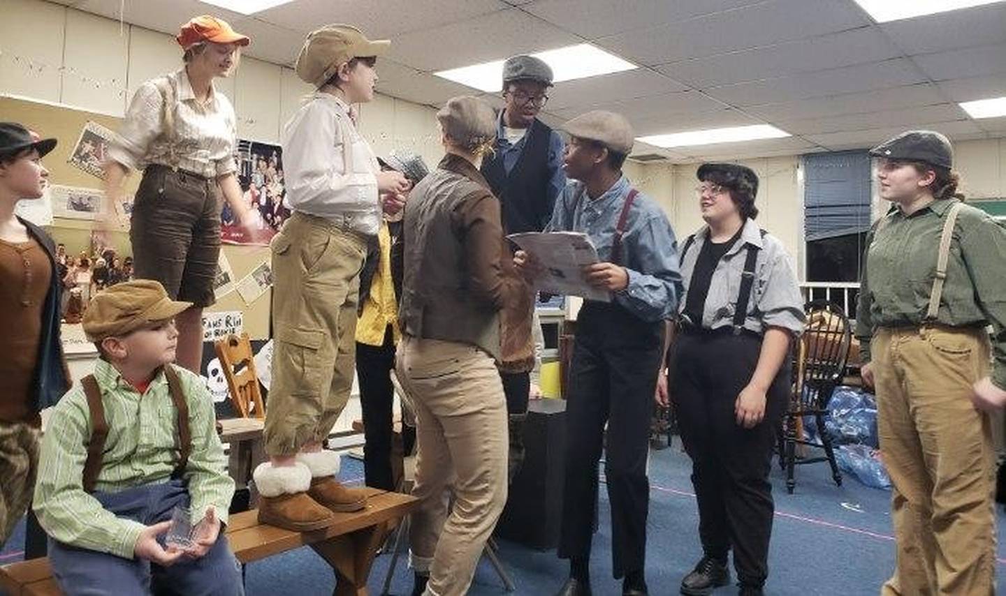 The Children’s Community Theatre of DeKalb County cast of "Newsie's" rehearsing a scene