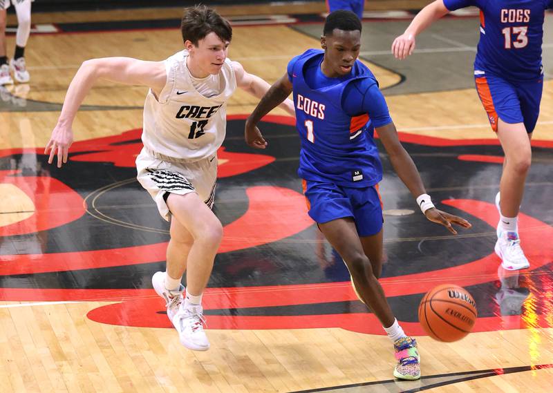 Genoa-Kingston's Joshua Bunting races up court against Indian Creek's Jakob McNally Wednesday, Jan. 25, 2023, during their game at Indian Creek High School in Shabbona.