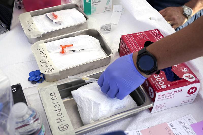 Syringes with vaccines are prepared at the L.A. Care and Blue Shield of California Promise Health Plans' Community Resource Center where they were offering members and the public free flu and COVID-19 vaccines Friday, Oct. 28, 2022, in Lynwood, Calif. The U.S. is poised to make COVID-19 vaccinations more like a yearly flu shot, a major shift in strategy despite a long list of questions about how to best protect against a still rapidly mutating virus.
The Food and Drug Administration asked its scientific advisers Thursday, Jan. 26, 2023, to help lay the groundwork for switching to once-a-year boosters for most Americans -- and how and when to periodically update the shots’ recipe. (AP Photo/Mark J. Terrill)