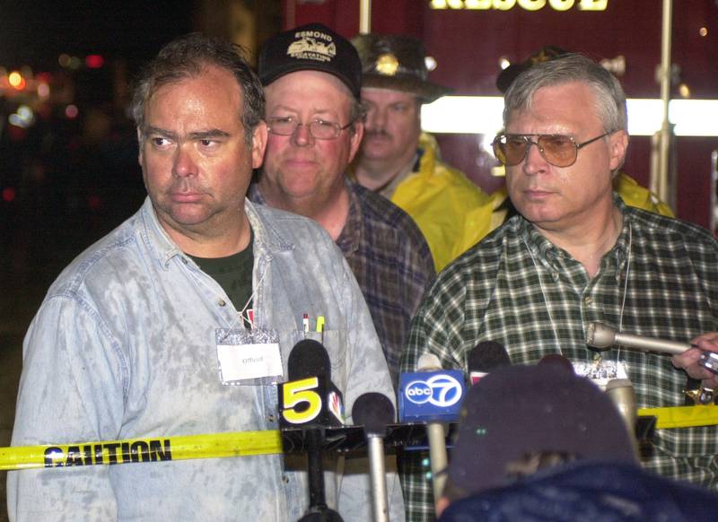 Former Utica Fire Chief Dave Edgcomb, former Utica mayor Fred Esmond and former La Salle County Sheriff Tom Templeton address Chicago media on the evening of the tornado on Tuesday April 20, 2004 downtown Utica.