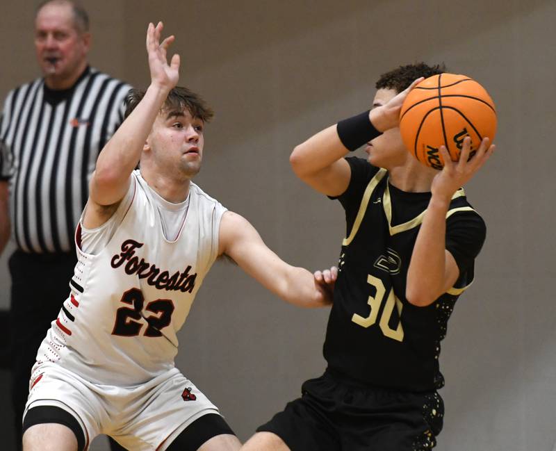 Forreston's Drayvin Peters guards Pecatonica's Izaiah Braimah during a NUIC game on Wednesday, Feb. 11, 2026 at Forreston High School.