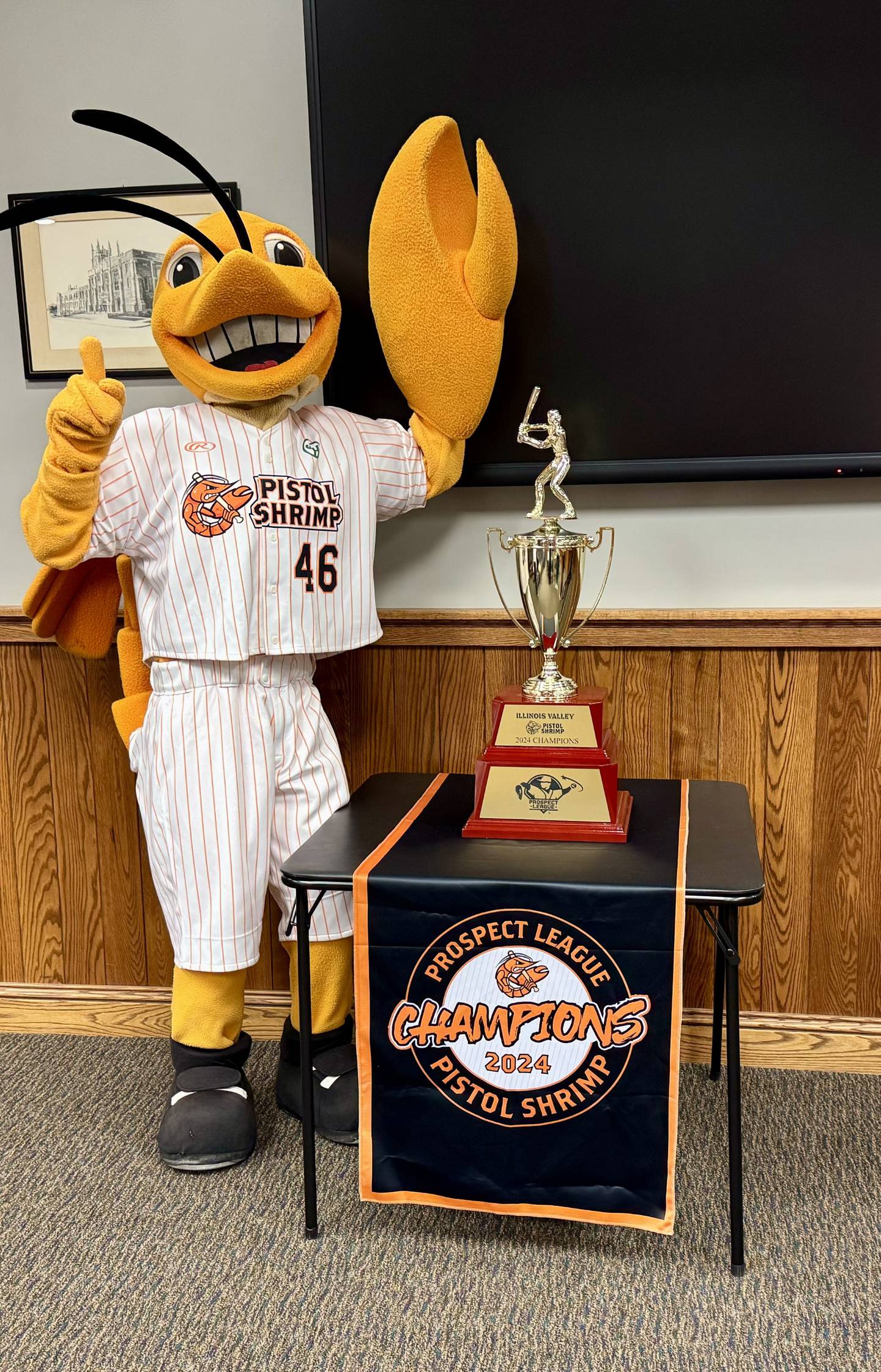 SouthClaw Sam poses with the 2024 Prospect League Championship trophy during Peru’s Monday night council meeting.