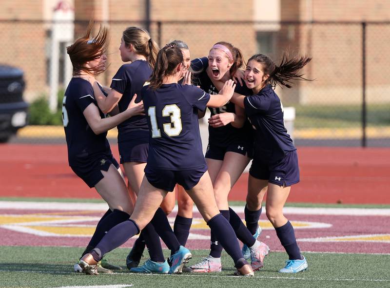 IC Catholic celebrates Allie Geiger's goal during the IHSA Class 1A girls soccer super-sectional match between Richmond-Burton and IC Catholic at Concordia University in River Forest on Tuesday, May 23, 2023.