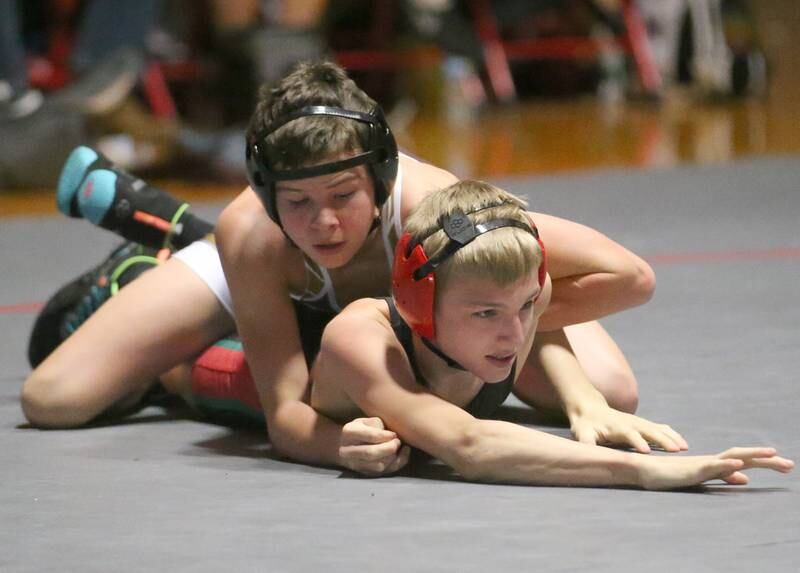 Morris's Brock Claypool wrestles L-P's Austin Herron on Thursday, Jan. 11 2024 in  Sellett Gymnasium.