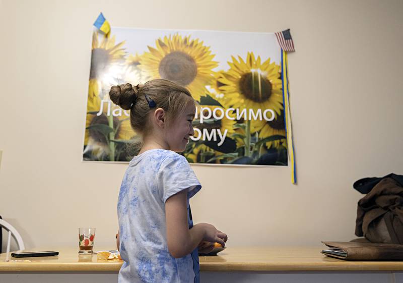 Nastya, 7, is attending Washington School In Dixon. Her lessons are being translated from English with an app on the computer.