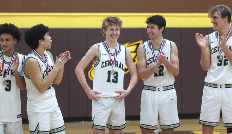 Grayslake Central’s Rams celebrate a 56-51 win over Crystal Lake South in Hinkle Holiday Classic Basketball Tournament title game action at Jacobs High School Friday.