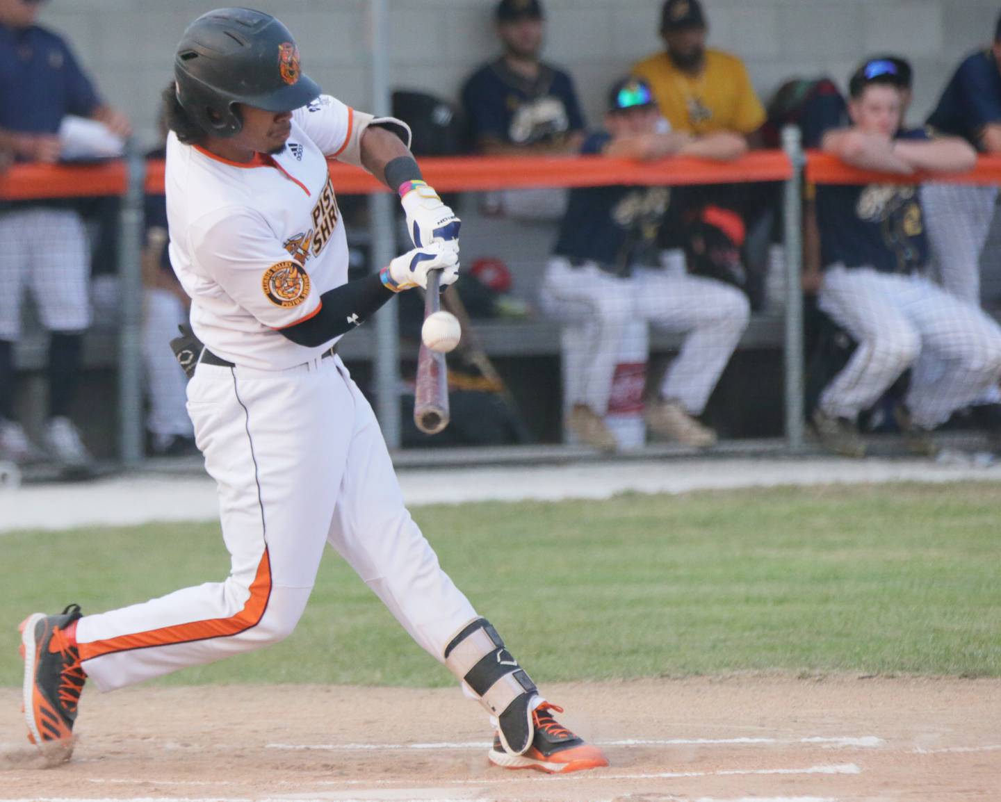 Pistol Shrimp's Keshawn Ogans, hits the ball against Lafayette during the final home game at Veterans Park in Peru on Wednesday Aug. 4, 2021.