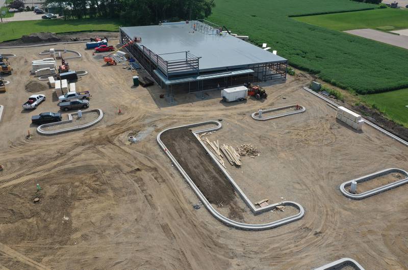 Crews continue to construct an Aldi grocery store on Tuesday, Aug. 13, 2025 at the intersection of Backbone Road and North Main Street in Princeton. Workers are beginning to build the exterior walls this week. The 20,000 square-foot store could be open by Thanksgiving.