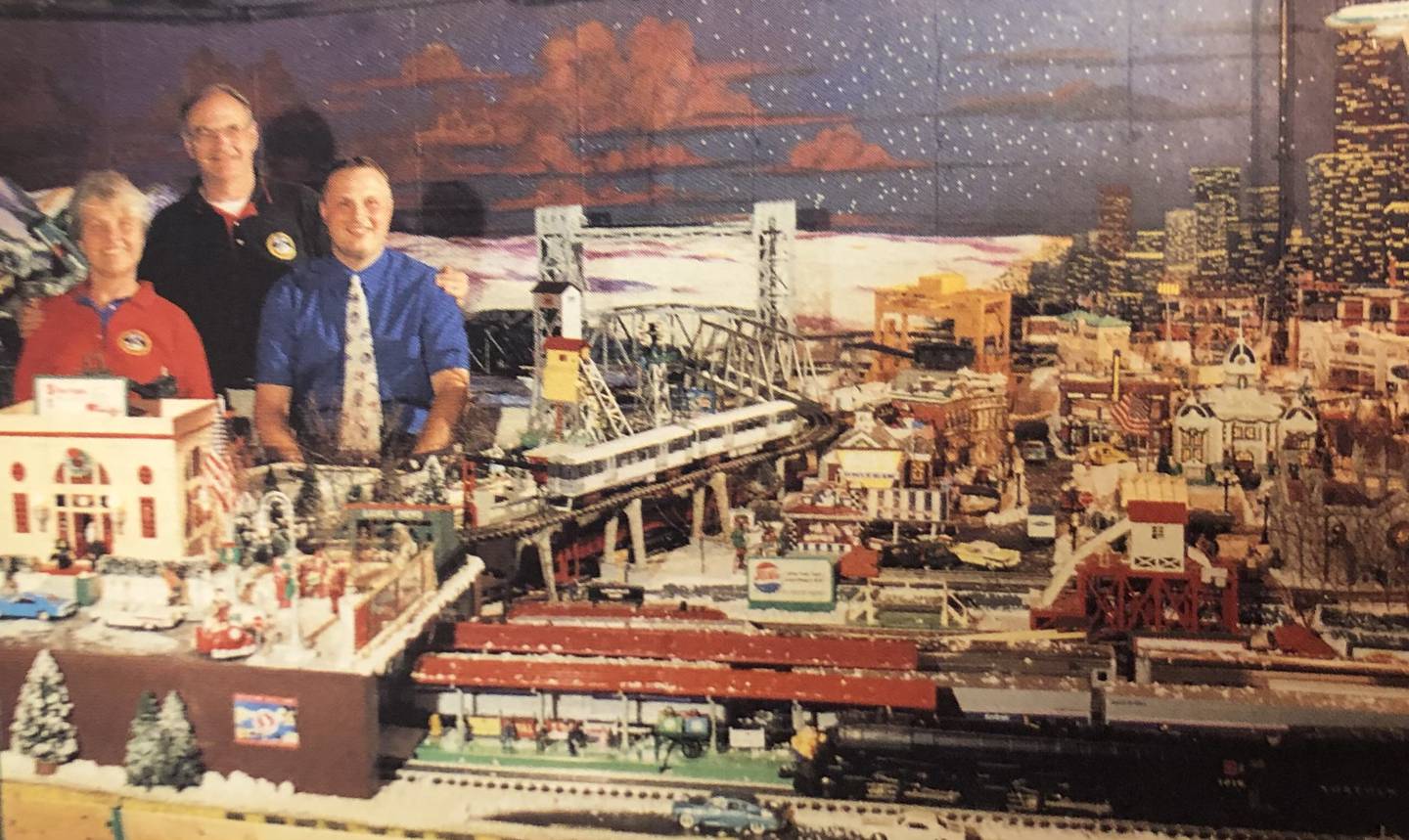 Wally Werderich with his parents Anita and George A. Werderich featured in Classic Toy Trains magazine's December 2003 edition.