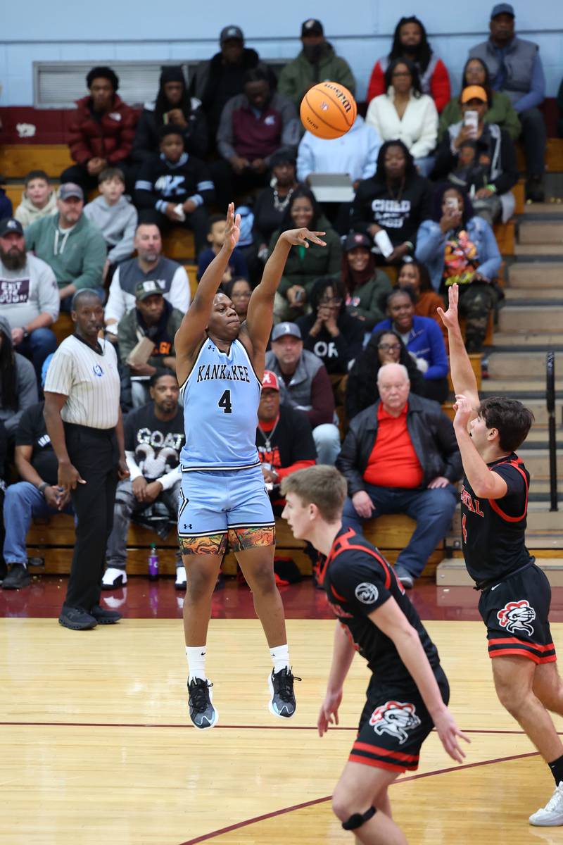 Kankakee's Myair Thompson pulls up for a shot during the Kays' 54-50 victory over Lincoln-Way Central in the 75th Kankakee Holiday Tournament maroon bracket championship on Sunday, Dec. 28, 2025.