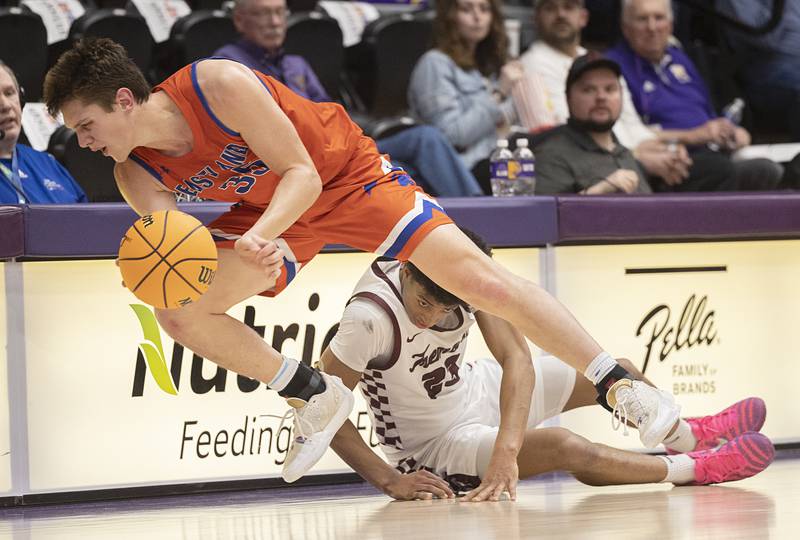 Eastland’s Parker Krugman saves a ball from going out of bounds against Tremont Monday, March 9, 2026, in the Class 1A Macomb Supersectional.