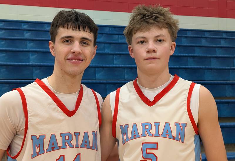 Marian Central's Colin Kowalsky (left) and Mark Jablonski helped lead the Hurricanes to a 56-24 win over Christian Life in the team's home opener Tuesday, Dec. 2, 2025, in Woodstock.