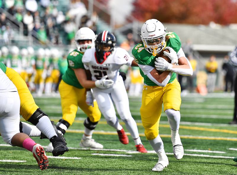 Providence Catholic's Broden Mackert (24) finds a opening during the class 5A first round playoff game against Springfield on Saturday, NOV. 01, 2025, at New Lenox.