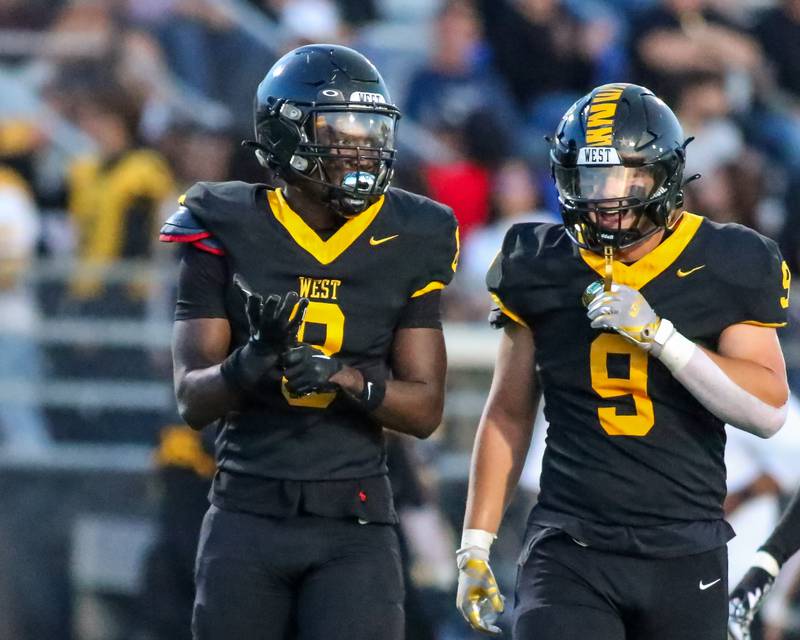 Joliet West's Micah Mcnair (8) after sacking the quarterback during football game between Plainfield North at Joliet West.  Sept 15, 2023.
