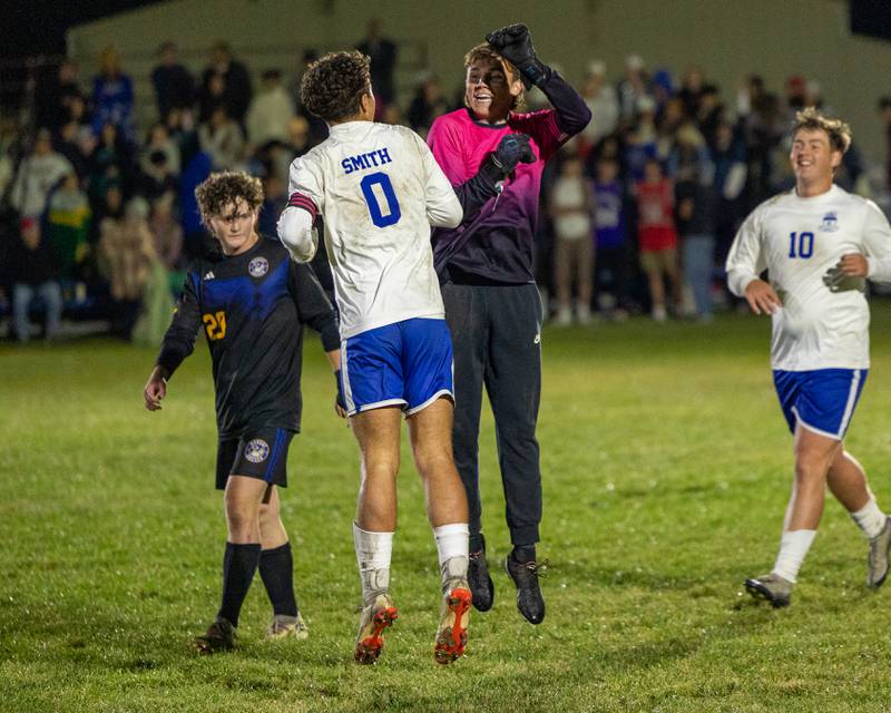 Sawyer Smith (0) of Hinckley-Big Rock and teammate Alex Casanas (1) celebrate win over Somonauk/Leland/Newark in the Little Ten Conference Championship match on Thursday, Oct. 9, 2025 at Hinckley-Big Rock School in Hinckley.