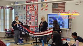 Amy Lindenborn opens window on world for Morris eighth graders