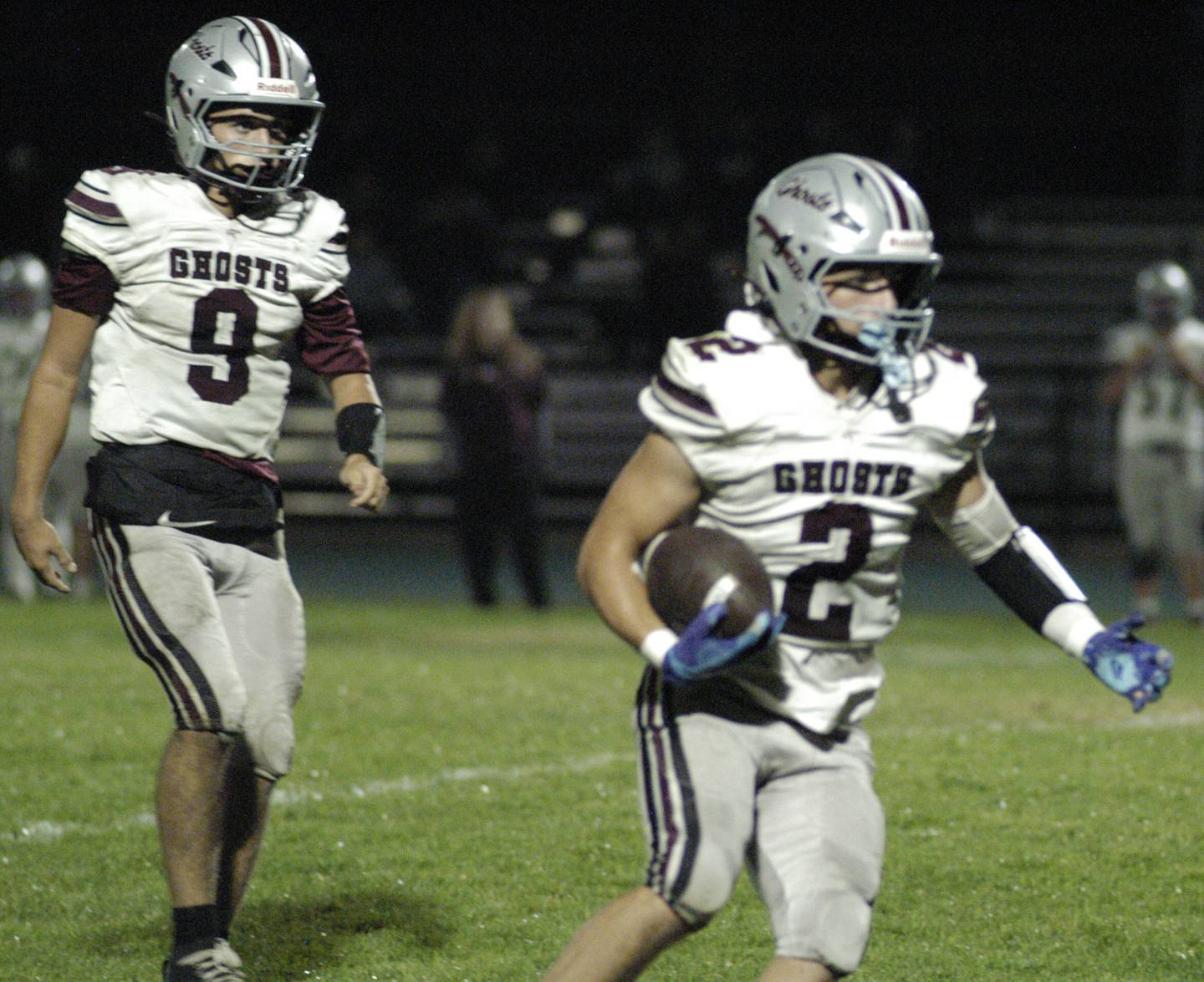 IVC player Sawyer Ellenwood takes a handoff from Keegan Schol. The Grey Ghosts of Illinois Valley Central traveled to Hinders Field in Rock Falls on Friday, October 10, 2025 to take on the Rockets.