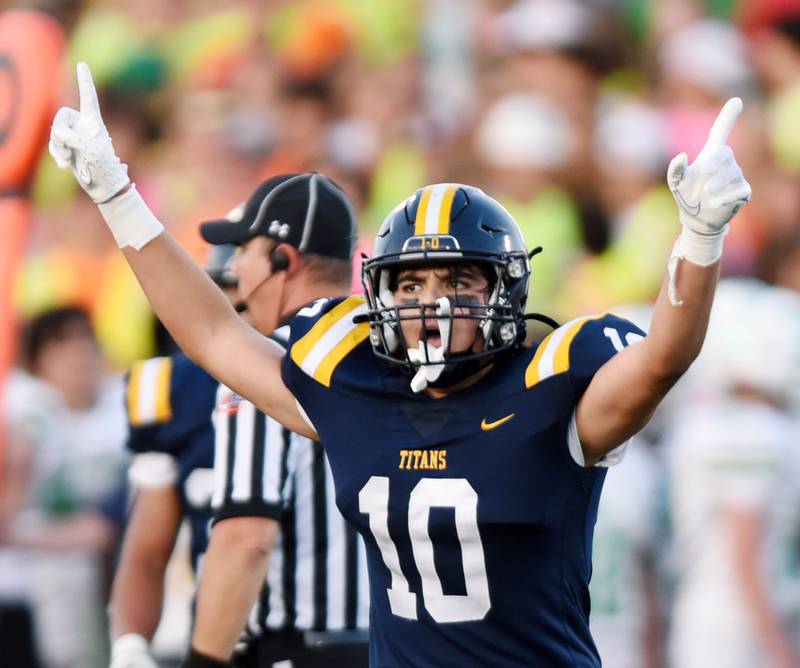 Joe Lewnard/jlewnard@dailyherald.com
Glenbrook South's Dennis Poulopoulos celebrates his interception against York during a football game played in Glenview, Ill. on Friday, Aug. 25, 2023.