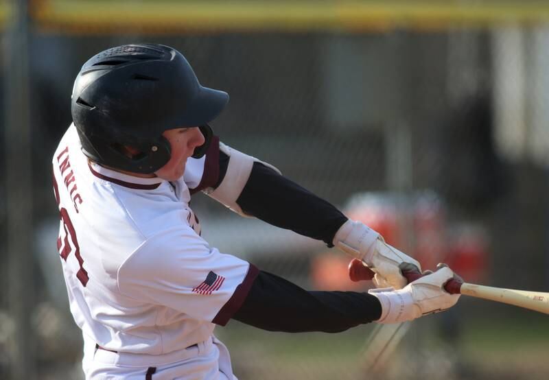 Prairie Ridge’s Connor Innis connects against Hampshire in varsity baseball on Wednesday, April 16, 2025, at Prairie Ridge High School in Crystal Lake.