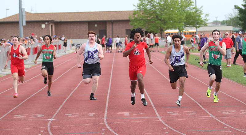 (From left) Ottawa's Levi Sheehan, L-P's Jaiden Torres, Rochell's Landon Delille, Ottawa's Colby Mortenson, Rochelle's Irving Escalante and L-P's Kaleb Kennedy compete in the 100 meter dash during the I-8 Boys Conference Championship track meet on Thursday, May 11, 2023 at the L-P Athletic Complex in La Salle.