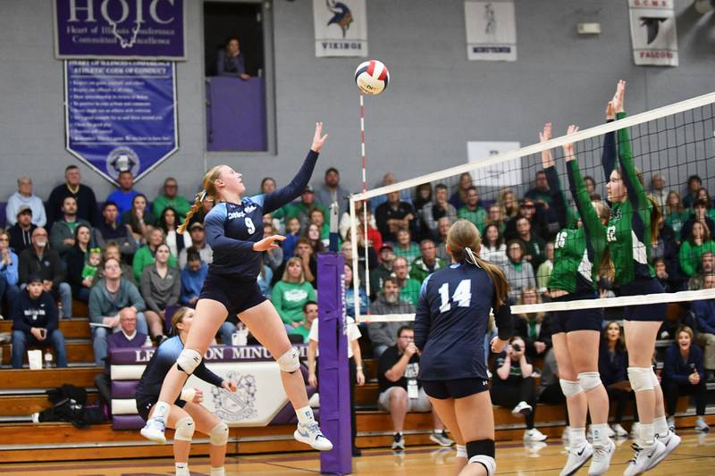 Cissna Park's Addison Lucht tips the ball over the block Monday night during the Timberwolves' victory in two sets, 20-23, 27-25, over Windsor in the IHSA Class 1A Lexington Super-Sectional.