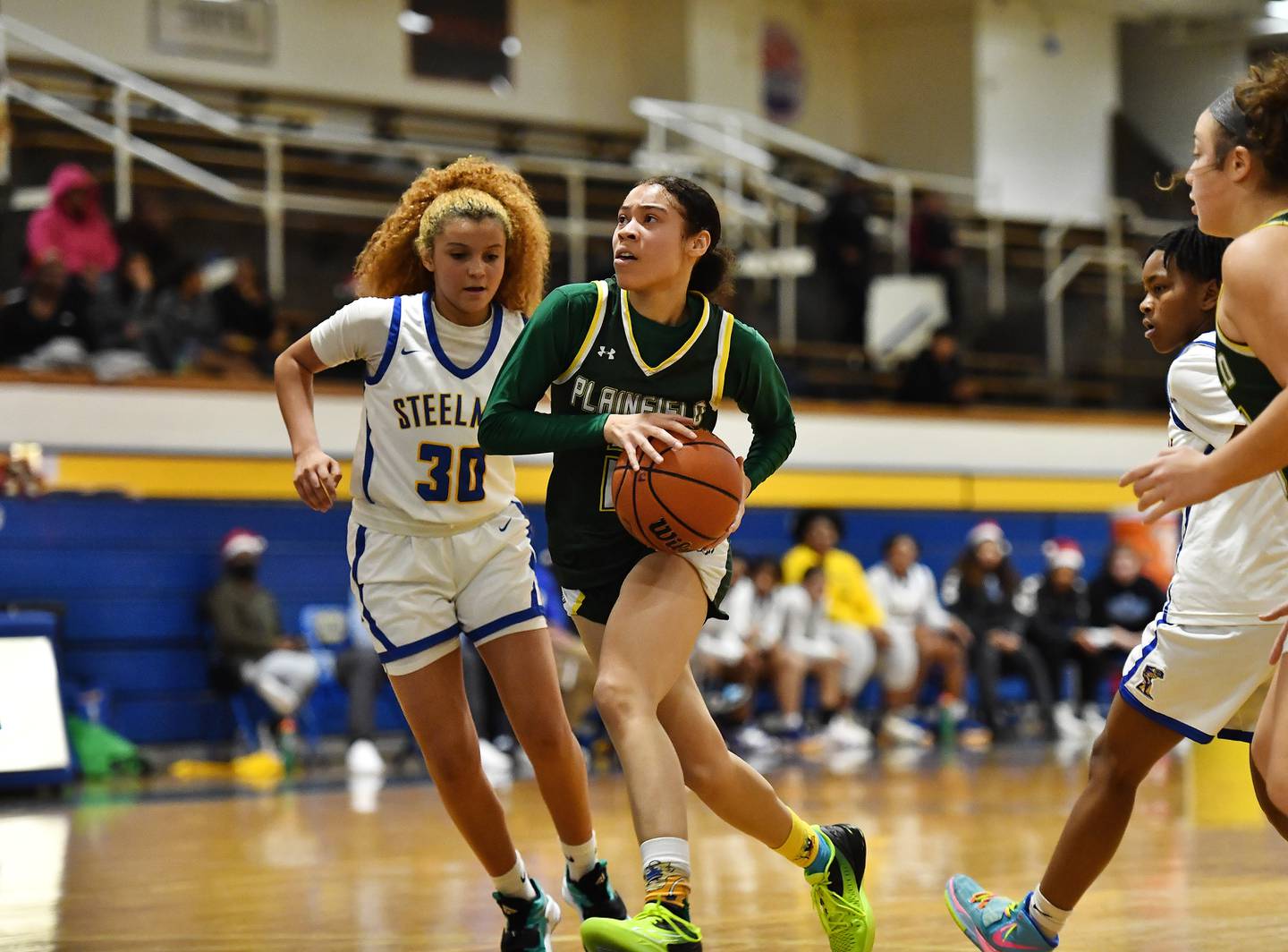 Plainfield Central's Aaliyah Frazier (2) drives down the lane during the SPC Conference game on Friday, Dec. 16, 2022, at Joliet.
