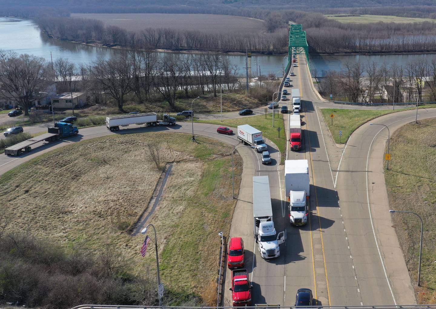 An aerial view of backed up traffic on Illinois Route 251 as a semi truck struck the U.S. Route 6 overpass on Monday, March 30, 2026 in Peru. Traffic was closed in both northbound and southbound directions on Illinios Route 251. Peru Police and Fire were on the scene. The incident happened shortly before 10a.m.