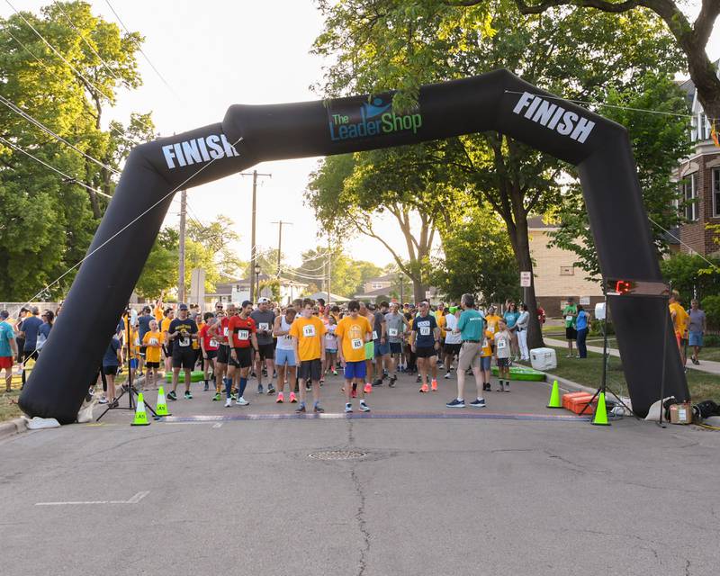 Participants get ready to take off during the start of the Leadershop 5k event on Friday June 9, 2023  held in La Grange.