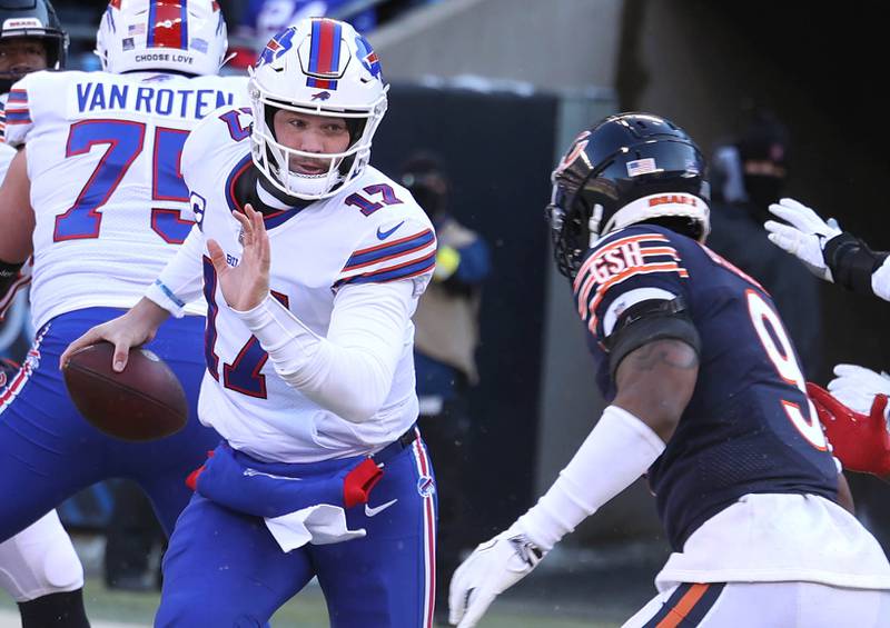 Chicago Bears safety Jaquan Brisker gets pressure on Buffalo Bills quarterback Josh Allen during their game Sunday, Dec. 24, 2022, at Soldier Field in Chicago.