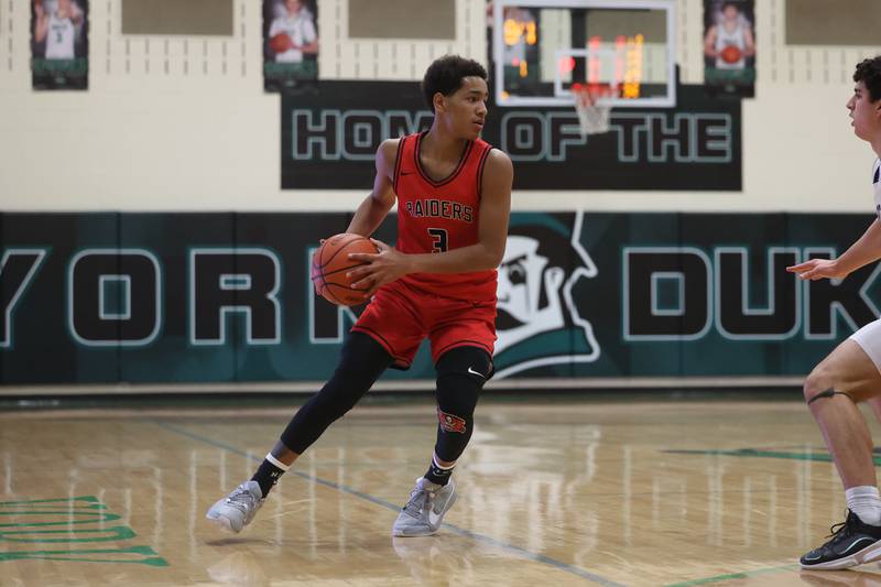 Bolingbrook’s Davion Thompson looks for a play against St. Francis in the Jack Tosh 2023 Holiday Classic on Wednesday, Dec.27th, 2023 in York.