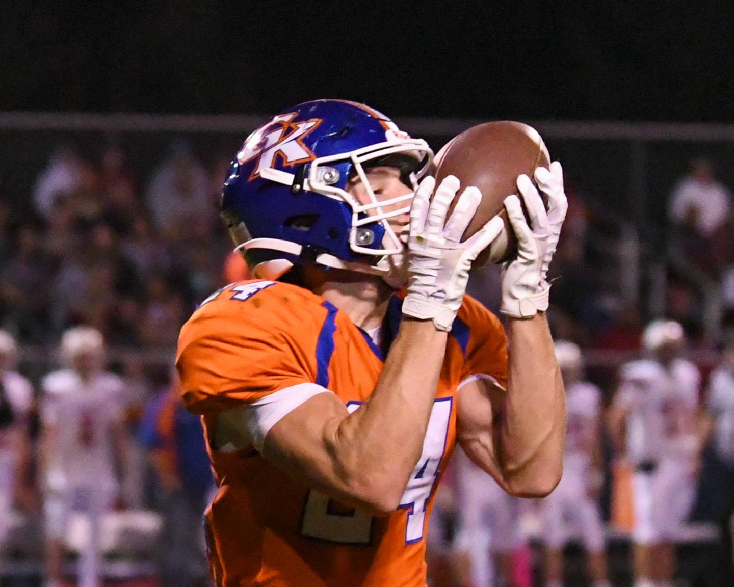 Genoa-Kingston's Patrick Young (24) catches a pass to run it in for a touchdown during the game on Friday Oct. 11, 2024, while taking on Stillman Valley that was held at Genoa-Kingston High School.