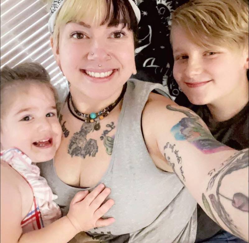 Emily Vangorkum (center) and her children are all smiles in this undated photo.