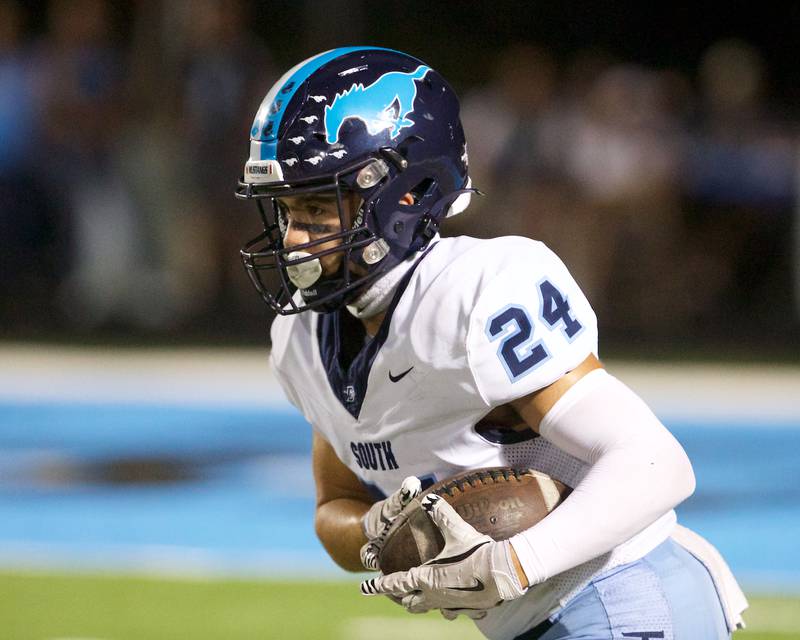 Downers Grove South's Joseph Vieyra runs the ball against Willowbrook on Friday, Sept. 20, 2024 in Villa Park.