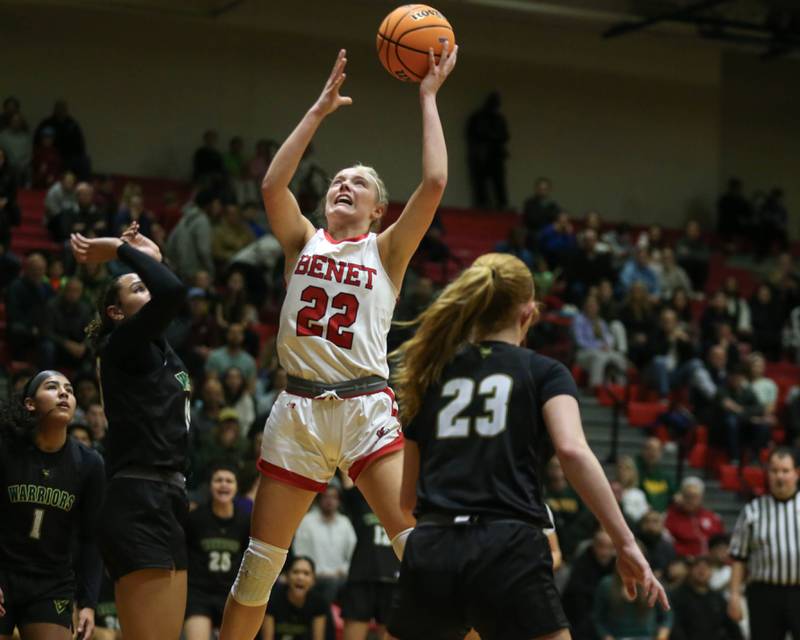 Benet's Bridget Rifenburg (22) puts up a shot during their Class 4A Bolingbrook Sectional final basketball game between Waubonsie Valley at Benet. Feb 27, 2025 in Bolingbrook.