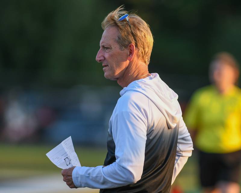 Wheaton Warrenville South's head coach Guy Callipari looks on during the game on Thursday Sept. 11, 2025, while taking on Wheaton North held at Wheaton Warrenville South.