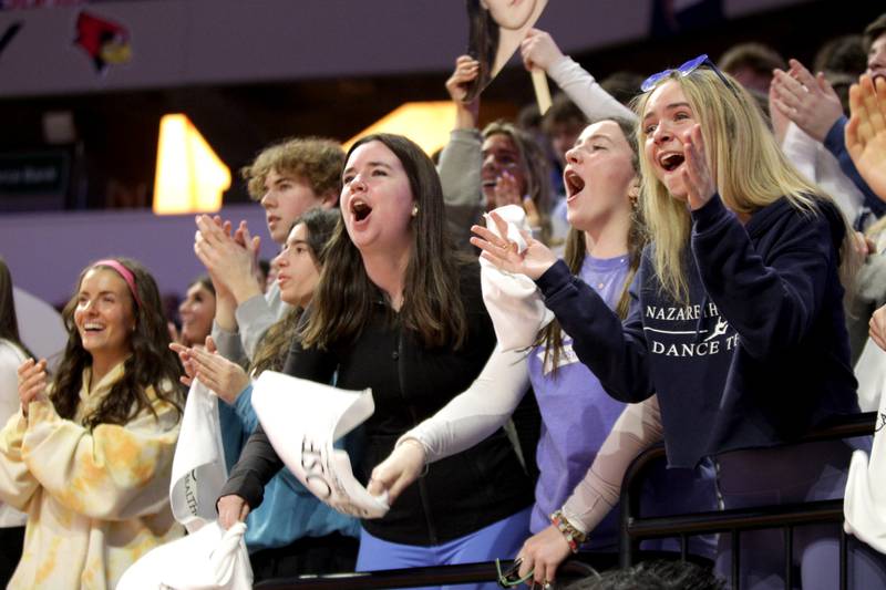 Nazareth fans cheer during the Class 3A girls basketball state semifinal against Peoria at Redbird Arena in Normal on Friday, March 3, 2023.