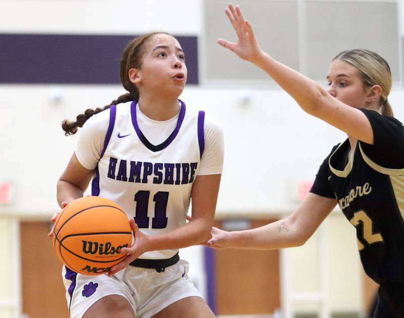 Hampshire’s Mikala Amegasse looks to the hoop against Sycamore in varsity girls basketball on Friday, Jan. 3, 2025, at Hampshire High School in Hampshire.