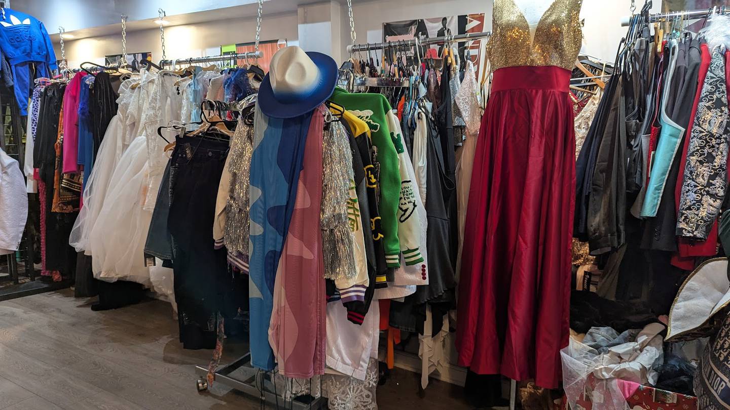 Fashionable clothing hangs from racks at Candy Kouture in Joliet on Tuesday, Feb. 25, 2025.