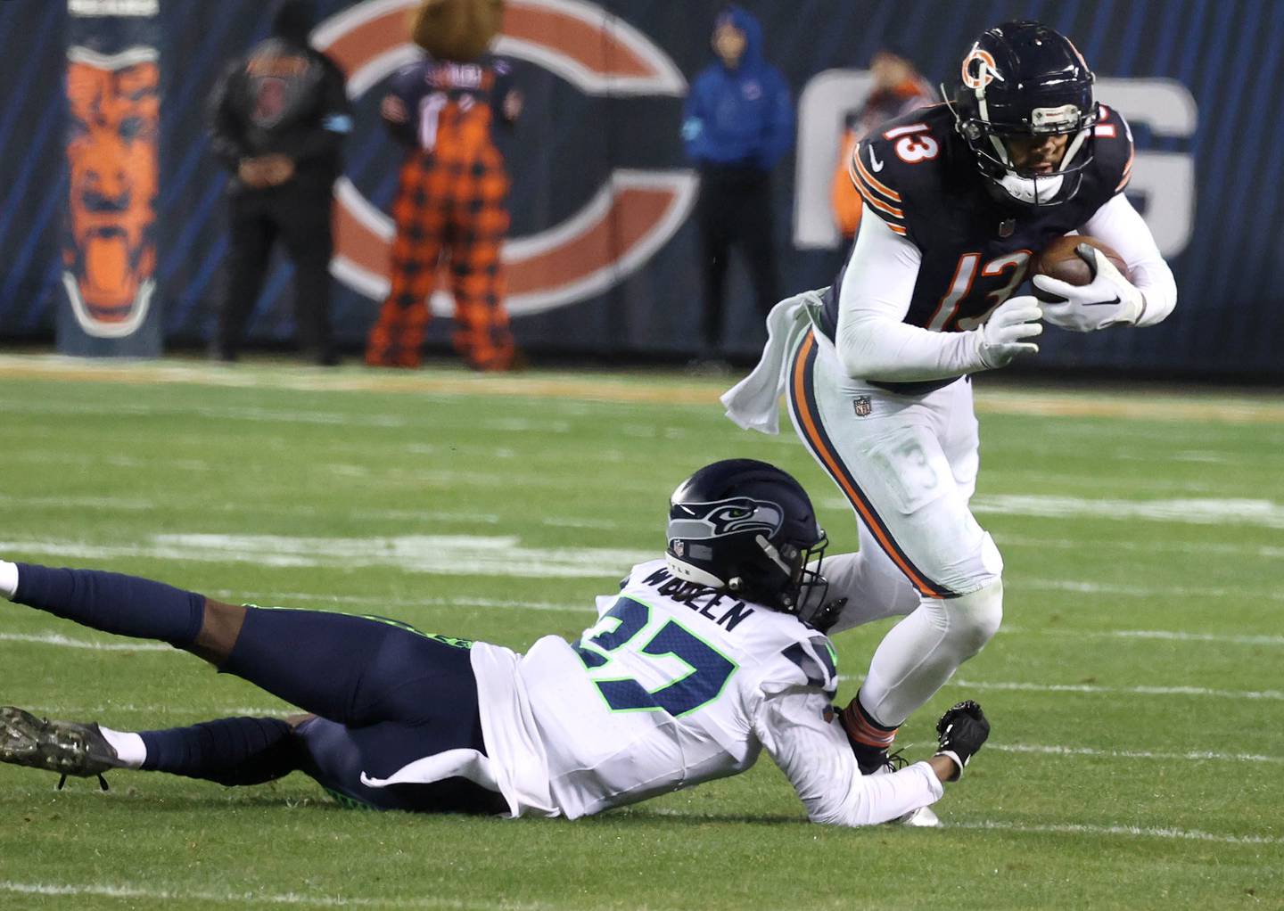 Chicago Bears wide receiver Keenan Allen escapes the grasp of Seattle Seahawks cornerback Riq Woolen during their game Sunday, Dec. 26, 2024, at Soldier Field in Chicago.