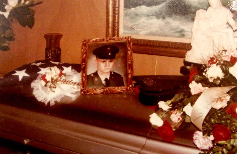 Family photos of the 1982 funeral services for Sgt. Steven J Olczyk are displayed as a remembrance was held Saturday at Wonder Lake Fire Protection District Station 2 on the 40th anniversary of a midair military jet explosion that happened over the small, rural area northeast of Woodstock.